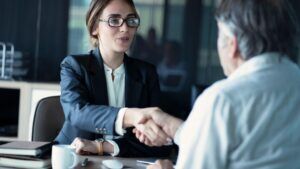 Phoenix Accidents and Injury Law Firm hit and run lawyers shaking hands with the client, knowing that they will handle their case in the best way possible