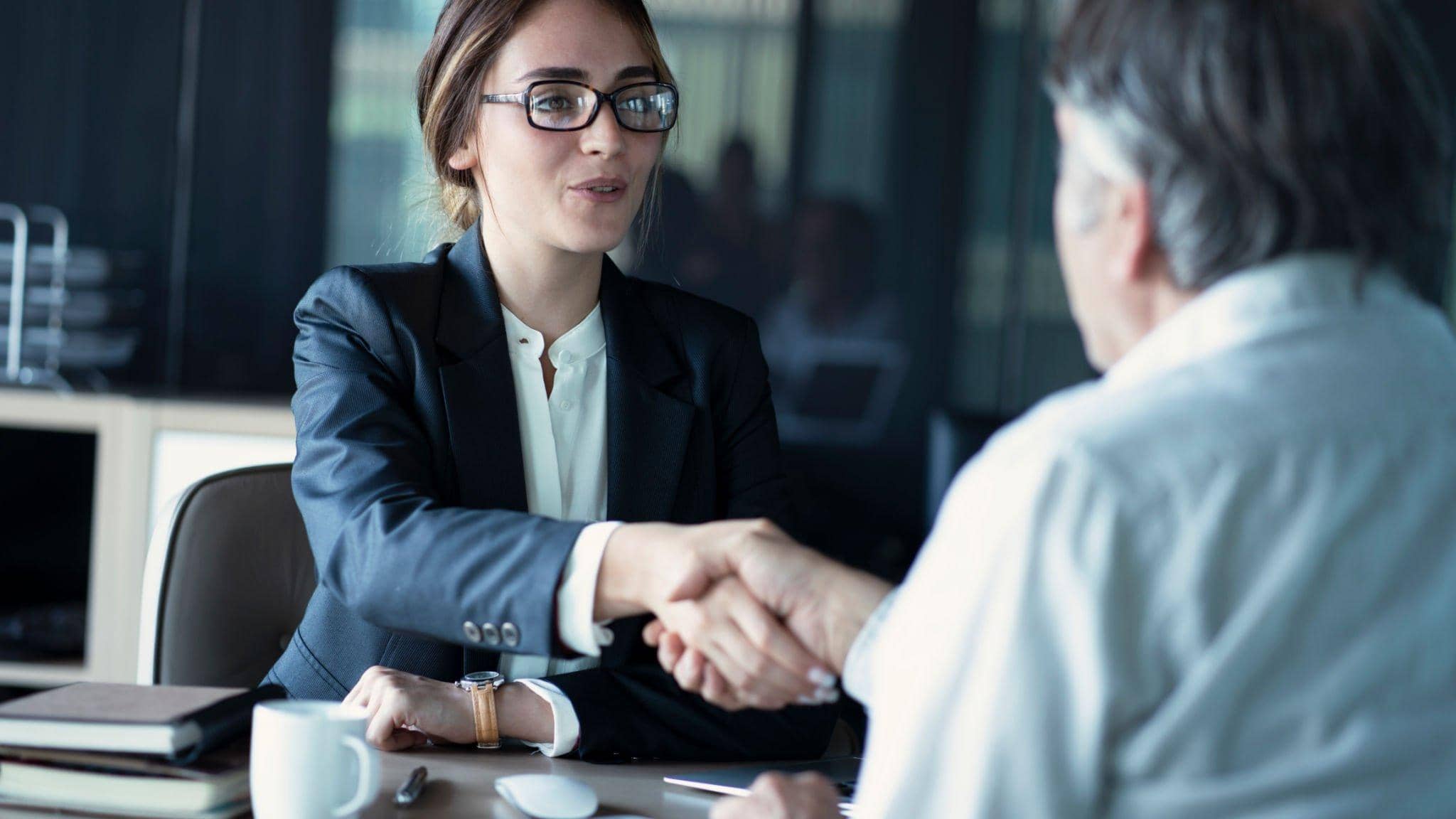 Phoenix Accidents and Injury Law Firm truck accident attorneys shaking hands with the client, knowing that they will handle their case in the best way possible