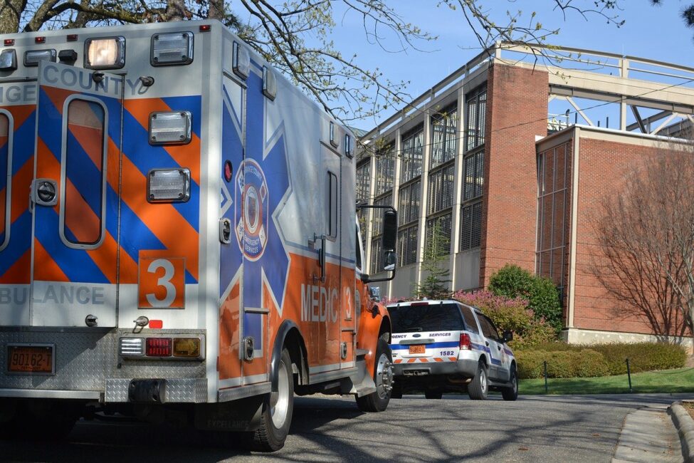 Ambulance assisting a patient to seek medical treatment after hit and run accidents