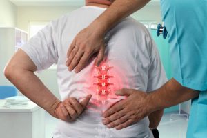 a patient, who is coping with back pain after auto accident, undergoes follow up check up