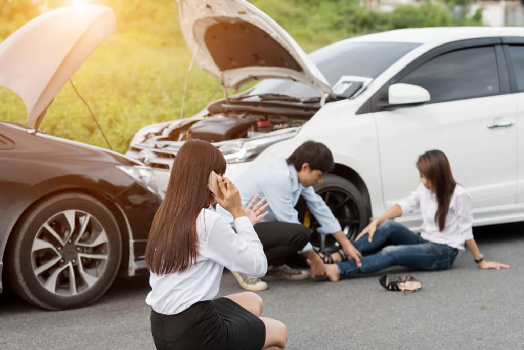 a woman is worried about the soft tissue damage after car accident