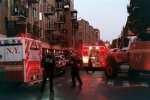 Paramedics helping people after a left turn accident. Call for left turn accident lawyers