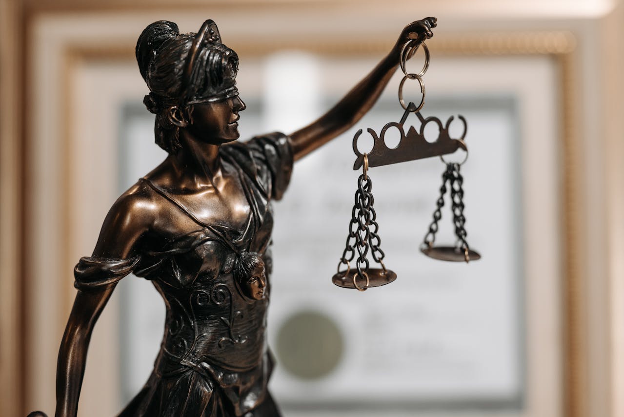 statue on personal injury lawyer desk