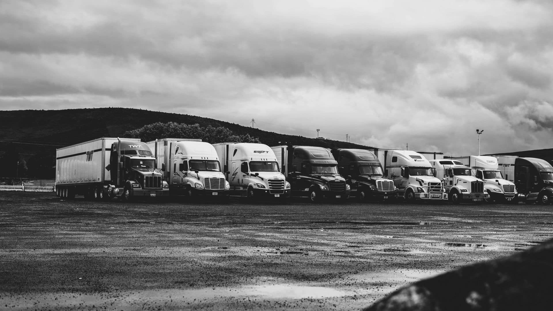 The Terrifying Truth about Trucker Safety Regulations. Trucks lining up Truckers Safety Regulations